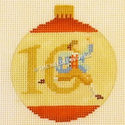yellow and red ornament with 10 and lord leaping through the zero