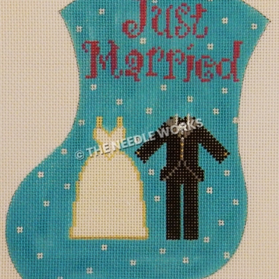 blue stocking with white polka dots and Just Married in purple and bridal gown and groom tux