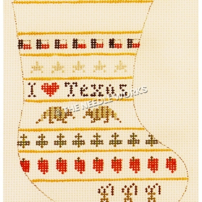 white stocking with I heart Texas in center, Texas flags, stars, armadillos, peppers, yellow roses, and oil derricks