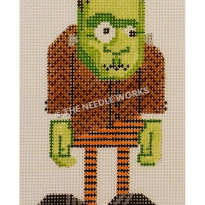 green Frankenstein in brown suit jacket and orange and black striped tights with black shoes