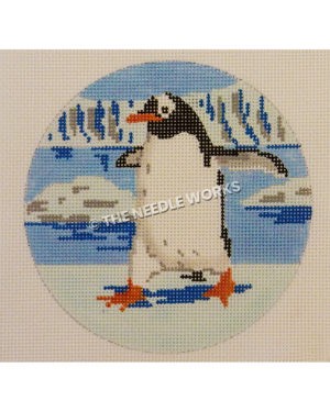 ornament with penguin strutting on snowy landscape with water and glaciers in background