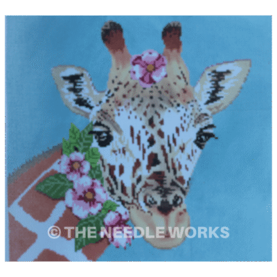 giraffe face with pink Hawaiian flowers on head and neck on blue background