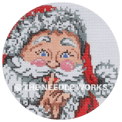 round ornament with Santa face with finger to lips to stay quiet