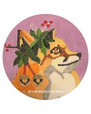 round ornament with fox wearing mistletoe and bells