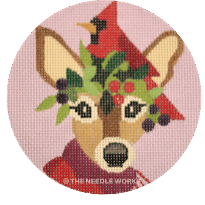 round ornament with deer's head wearing a cardinal and mistletoe on its head
