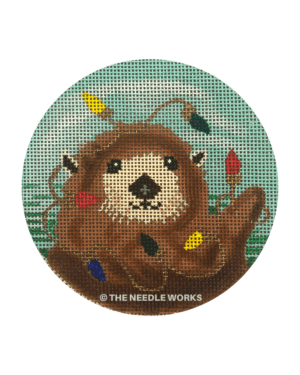 round ornament with sea otter decorated in Christmas lights