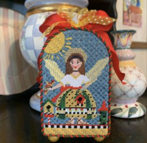 brunette angel with red birds and birdhouse in 3D box shape