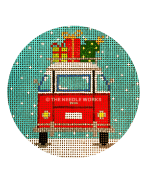 round ornament with red bus in snow with gifts on top of roof