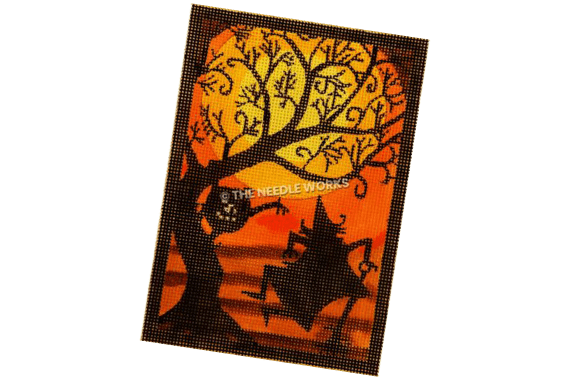 dancing witch by tree with jackolantern with harvest moon background