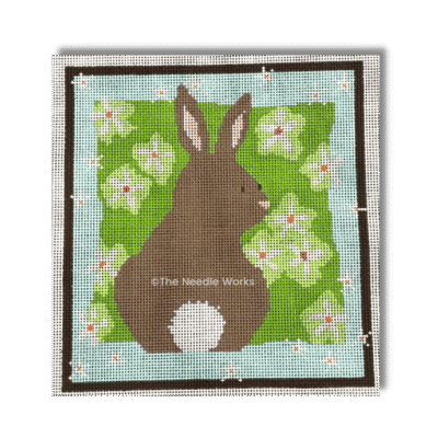 BROWN BUNNY IN THE GARDEN