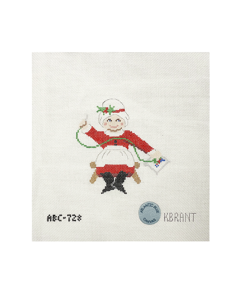 Needlepointing Mrs Claus
